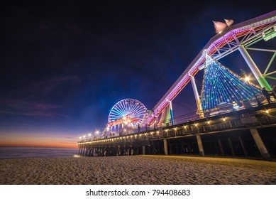 LOS ANGELES - December 29: Santa Monica Pier, Ferris Wheel & Rides, Los Angeles Beach Scenic At Night On December 29 2017 Los Angeles USA.