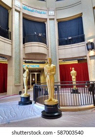 LOS ANGELES, FEB 24TH, 2017: Large Golden Oscar Statues Guard The Entrance To The Dolby Theatre Where The Academy Awards Are Held.