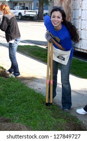 LOS ANGELES - FEB 9:  Theresa Castillo Digging New Fence Post Hole At The 4th General Hospital Habitat For Humanity Fan Build Day At The 191 E. Marker Street On February 9, 2013 In Long Beach, CA