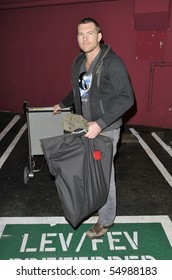 LOS ANGELES - JANUARY 27: Australian Actor Sam Worthington Is Seen At LAX. January 27th In Los Angeles, California.