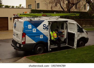 Los Angeles - January 29, 2021: Spectrum Service Technician Sitting In Van Day Exterior