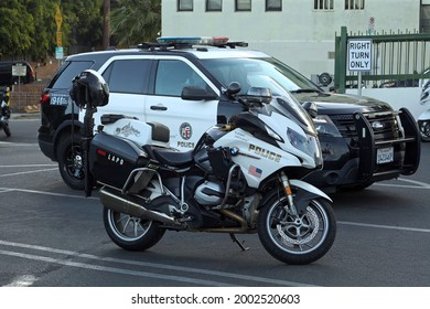 Los Angeles - July 2, 2021: 
Los Angeles Police Department parol SUV and motorcycle day exterior