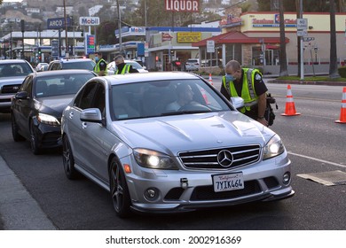 Los Angeles - July 2, 2021: 
Los Angeles Police Officers Conducting Field Sobriety Tests On Sunset Blvd. Day Exterior