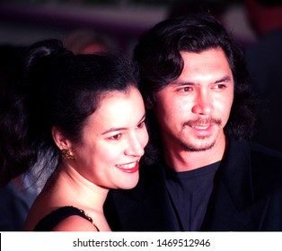 LOS ANGELES - July 29, 1993:: Actor Lou Diamond Phillips And His Girlfriend Jennifer Tilly Leave The Ivy Restaurant.