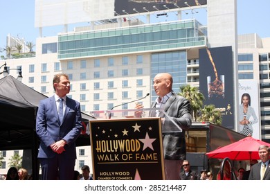 LOS ANGELES - JUN 2:  Bobby Flay, Michael Symon At The Bobby Flay Hollywood Walk Of Fame Ceremony At The Hollywood Blvd On June 2, 2015 In Los Angeles, CA