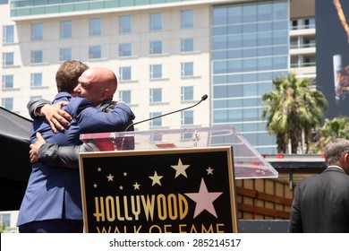 LOS ANGELES - JUN 2:  Bobby Flay, Michael Symon At The Bobby Flay Hollywood Walk Of Fame Ceremony At The Hollywood Blvd On June 2, 2015 In Los Angeles, CA