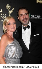 LOS ANGELES - JUN 22:  Maura West, Ron Carlivati At The 2014 Daytime Emmy Awards Arrivals At The Beverly Hilton Hotel On June 22, 2014 In Beverly Hills, CA