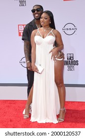 LOS ANGELES - JUN 27:  Megan Thee Stallion And Pardi {Object} Arrives For The 2021 BET Awards On June 27, 2021 In Los Angeles, CA                