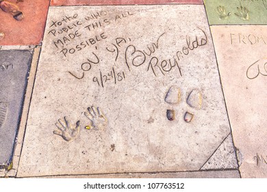 LOS ANGELES - JUNE 26:  handprints of Burt Reynolds in Hollywood Boulevard on June 26,2012 in Los Angeles. There are nearly 200 celebrity handprints in the concrete of Chinese Theater.
