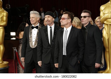 LOS ANGELES - MAR 2:: The Edge, Adam Clayton, Bono, Larry Mullen Jr.  At The 86th Annual Academy Awards At Hollywood & Highland Center On March 2, 2014 In Los Angeles, California