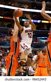 LOS ANGELES - MARCH 10: Arizona Wildcats G Lamont Jones #12 Drives To The Basket And Lays The Ball Up During The NCAA Pac-10 Tournament Basketball Game On March 10 2011 At Staples Center.