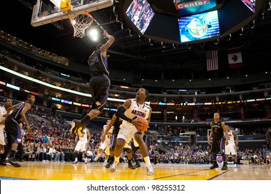 LOS ANGELES - MARCH 12: Arizona Wildcats F Solomon Hill #44 (R) & Washington Huskies G Terrence Ross #31 (L) During The NCAA Pac-10 Tournament Basketball Championship Game On March 12 2011 In Los Angeles, CA.