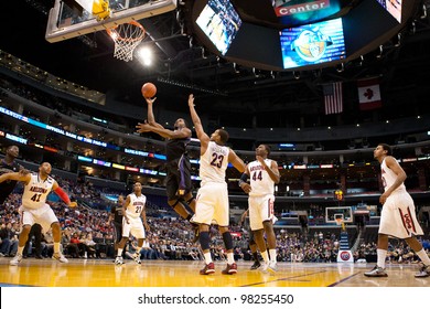 LOS ANGELES - MARCH 12: Washington Huskies F Matthew Bryan-Amaning #11 Lays The Ball Up During The NCAA Pac-10 Tournament Basketball Championship Game On March 12 2011 At Staples Center In Los Angeles, CA.