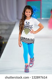 Los Angeles - March 13: A Child Model Walks The Runway At The Hollywood Kids Fall Winter 2013 Fashion Show During STYLE Fashion Week At Vibiana Cathedral On March 13, 2013 In Los Angeles, CA.