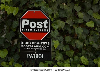 Los Angeles - March 5, 2021: Selective Focus Of Post Alarm Systems Yard Sign Day Exterior