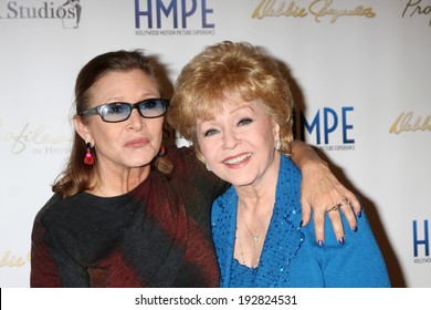 LOS ANGELES - MAY 14:  Carrie Fisher, Debbie Reynolds at at the "Debbie Reynolds: The Auction Finale" VIP Reception at Debbie Reynolds Dance Studio on May 14, 2014 in North Hollywood, CA