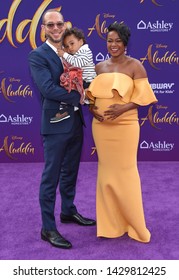 LOS ANGELES - MAY 21:  Vaughn Rasberry, Edward Rasberry and Tatyana Ali arrives for the 'Aladdin' World Premiere on May 21, 2019 in Hollywood, CA