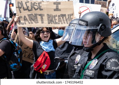 LOS ANGELES - MAY 30, 2020: Unidentified Participants Confronting The Police During The Protest March Against Police Violence Over Death Of George Floyd.