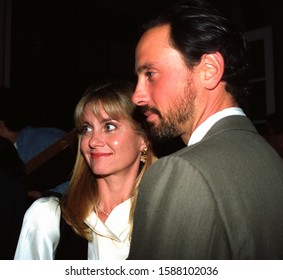 Los Angeles - May 5, 1993: Singer Olivia Newton-John And Her Husband Matt Lattanzi Leave Chasen's Restauerant.