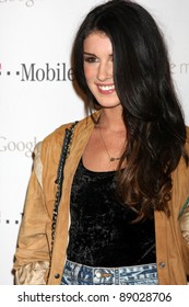 LOS ANGELES - NOV 16:  Shenae Grimes Arrives At The Google Music Launch At Mr. Brainwash Studio On November 16, 2011 In Los Angeles, CA