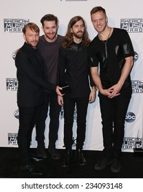 LOS ANGELES - NOV 23:  Ben McKee, Daniel Platzman, Daniel Wayne Sermon, Dan Reynolds, Imagine Dragons At The 2014 American Music Awards At The Nokia Theater On November 23, 2014 In Los Angeles, CA