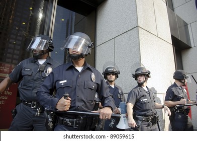 LOS ANGELES - NOVEMBER 17: Riot Police Stand Guard Outside A Building Of Bank Of America During A Occupy LA Rally On November 17, 2011 In Los Angeles, CA.