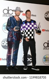 LOS ANGELES - OCT 9:  Brian Kelley, Tyler Hubbard At The 2018 American Music Awards At The Microsoft Theater On October 9, 2018 In Los Angeles, CA