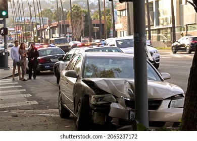 Los Angeles - October 24, 2021: 
LAPD Police Officer Investigates A Traffic Accident On Sunset Boulevard In Hollywood