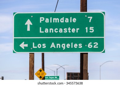 Los Angeles, Palmdale And Lancaster Highway Sign In California's Mojave Desert.  