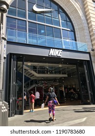 LOS ANGELES, SEP 22, 2018: Customers enter the Nike store at the Grove shopping mall at Third and Fairfax in Los Angeles.