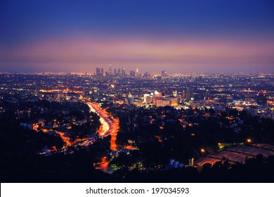 Los Angeles Skyline At Night, View From Hollywood Hills Towards 101 Freeway And Downtown.