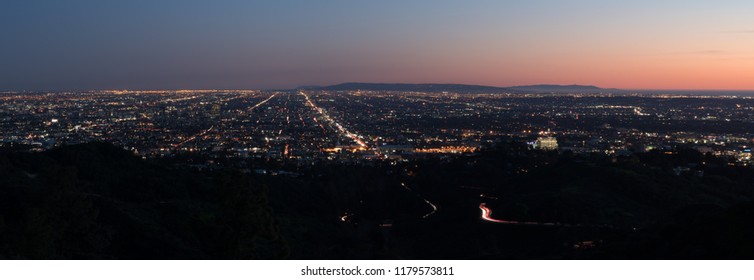 Los Angeles sunset, California, USA downtown skyline from Griffith park panoramic view - Powered by Shutterstock