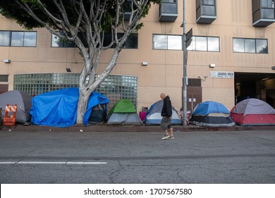 Los Angeles, USA - 03.20.2020: Homeless people tents in Skid Row district of  Downtown of Los Angeles, CA on March 20, 2020.