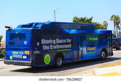 LOS ANGELES, USA - AUG 29, 2017: Powered by compressed natural gas blue bus in LA. Fewer emissions cleaner air technology.