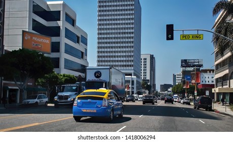 Los Angeles, USA. Circa September 2013. View of street traffic on Wilshire boulevard, in the mid Wilshire district of Los Angeles, California.