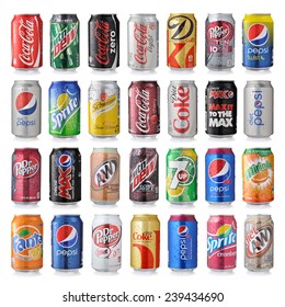 LOS ANGELES, USA - DECEMBER 22, 2014 Collection of various brands of soda drinks in aluminum cans isolated on white. 