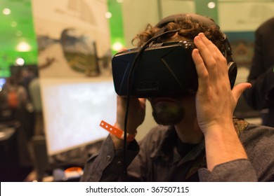 Los Angeles, USA - January 23, 2016: Man Tries Virtual Reality Headset During VRLA Expo Winter, Virtual Reality Exposition, At The Los Angeles Convention Center.