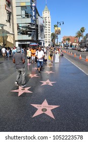 Los Angeles, USA – July 10, 2017: People On Hollywood Walk Of Fame In Hollywood, California. In Front The Star Of Bob Thomas