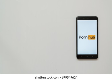 Los Angeles, USA, july 13, 2017: Pornhub logo on smartphone screen on white background.