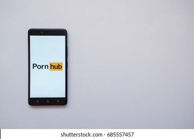 Los Angeles, USA, july 13, 2017: Pornhub logo on smartphone screen on white background.