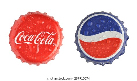 LOS ANGELES , USA - JUNE 3, 2015 Caps Of Coca Cola And Pepsi With Water Drops Isolated On White Bacground