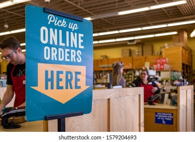 LOS ANGELES, USA, - MARCH, 27, 2018: 'Online Orders Pick Up' sign in a store in Los Angeles, California, USA.
