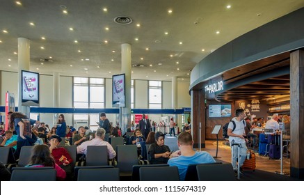 Los Angeles, USA - Nov 24, 2017: In Los Angeles International Airport (LAX), At The Domestic Boarding Lounge Area. Travelers Are Gathered Around The Area Awaiting The Boarding Routine.