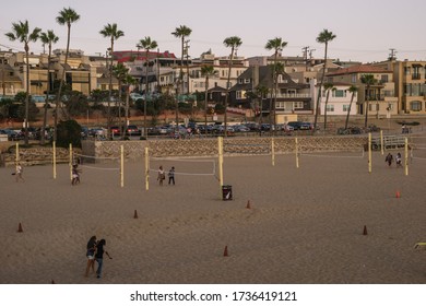 Los Angeles, USA - October 4, 2015: People Play At Volleyball On The Manhattan Beach, California.