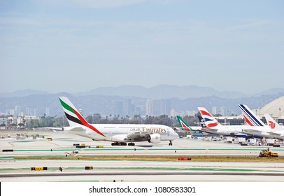 LOS ANGELES/CALIFORNIA - APRIL 21, 2018: Emirates Airbus A380 aircraft taxiing along the taxiway upon arrival at Los Angeles International Airport. Los Angeles, California USA