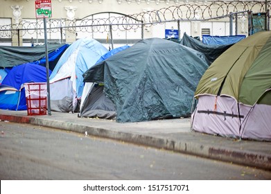 LOS ANGELES/CALIFORNIA - SEPT. 28, 2019: Homeless Encampment Along The Roadside Downtown Depicting The Growing Epidemic Of Homelessness In The City Of Los Angeles. Los Angeles, California USA