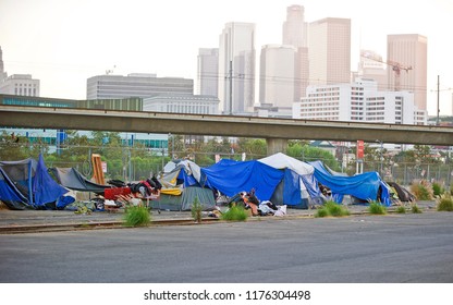LOS ANGELES/CALIFORNIA - SEPT. 9, 2018: Homeless encampment along the roadside depicting the growing epidemic of homelessness in the City of Los Angeles. Los Angeles, California USA