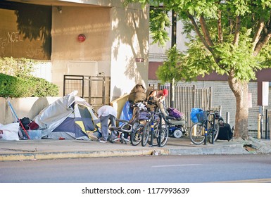 LOS ANGELES/CALIFORNIA - SEPT. 9, 2018: Homeless encampment along the roadside depicting the growing epidemic of homelessness in the City of Los Angeles. Los Angeles, California USA