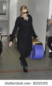 LOS ANGELES-FEBRUARY 26: Singer Madonna Is Seen At LAX. February 26, 2010 In Los Angeles, California