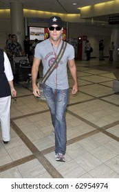 LOS ANGELES-JULY 22: Actor Dane Cook Is Seen At LAX . July 22nd, 2010 In Los Angeles, California